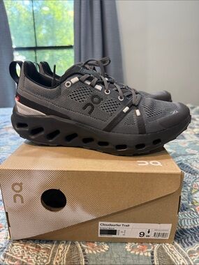 On Running Cloudsurfer Trail women's Black/Charcoal Sneakers